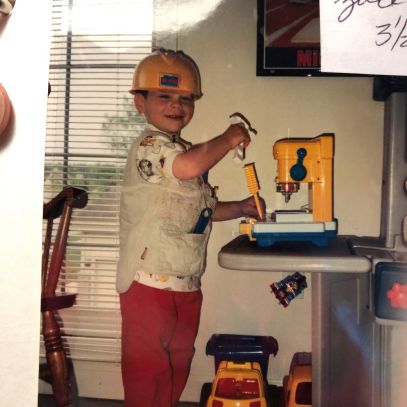 Zack hammering as a child