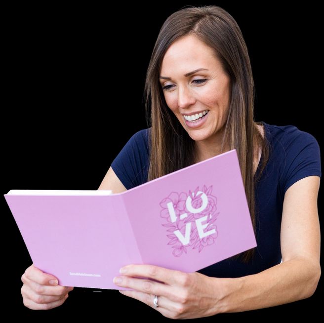 A woman holding a video book